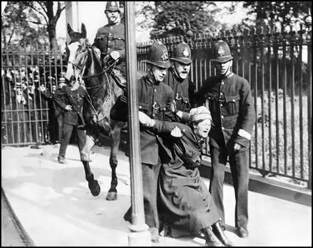 A suffragette being arrested in 1910.