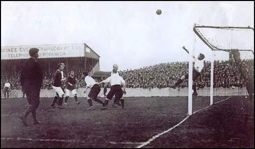 The Liverpool goalkeeper punches out a shot against Arsenal on 6th October 1906.