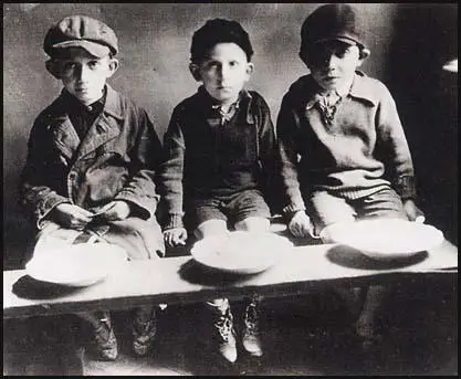 Three boys in the Warsaw ghetto in 1940.