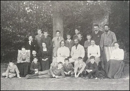 Staff and pupils of Bedales School : Oswald Powell (right back row), Winifred Powell (seated left). John Badley and his wife and his wife's sister, Elsie Garrett, on his left (1893)