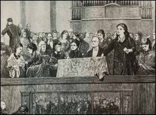 Rhoda Garrett speaking at a women's rights meeting (Millicent Fawcett seated front left) on 10th May 1872