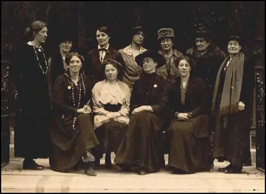 Photograph of the Women's Freedom League Committee. The women are identified on reverse: Mrs Mustard, Miss Clarke, Dr Knight, Miss Evans, Miss Underwood, Miss Gibson, Miss Hodge, Mrs Schofield Coats, Mrs Sproson, Miss Head and Mrs Wheaton (c. 1914)