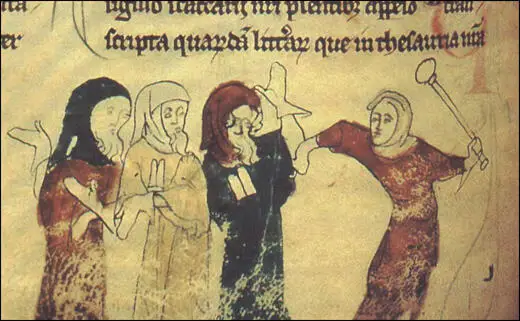 An image of Jews being beaten from a 13th century English manuscript. The figures in blue and yellow are wearing a badge in the shape of two tablets, identifying them as Jews