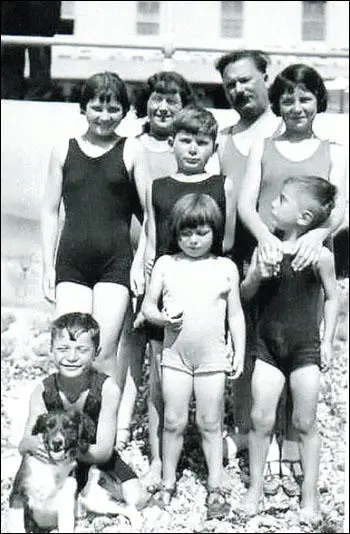 (6) The Goodall Family enjoying a day at the beach at Bognor. Mum, (Dulcie) is centre in the front with her favourite brother Cliff (Clifford) with the family dog and her brother Cecil beside her. Her older brother Norman is behind her with her sister Ivy left of Norman and her favourite sister Carol, right of Norman. Her parents are at the back.