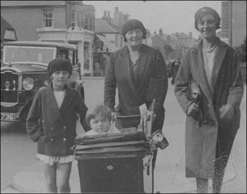 (7) Mum (Dulcie) being pushed in the pram by her mother. One of her older sisters, Ivy is walking to one side of the pram and her aunty Ivy, her mum’s sister, is walking next to her mother.