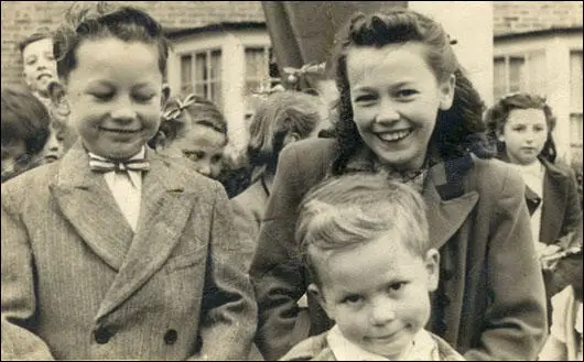 John Simkin (wearing his Union Jack bowtie) Tricia Simkin and David photographed in Chingford, Essex, during the celebrations marking the Coronation of Queen Elizabeth II in June 1953. Later, my sistor would tear-up this picture, but was restored in photoshop.