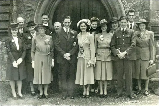 My parents' wedding in Tunbridge Wells with Nana on Mums' left and Grandma on Dad's right and Grandad extreme left of photo. Note the difference in dress between Grandmother and Nana! (1948)
