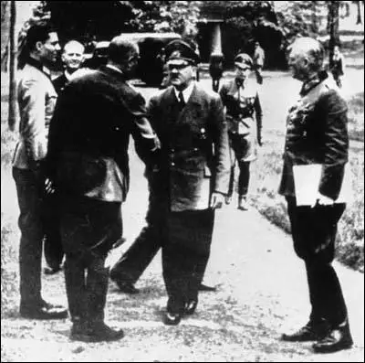 Adolf Hitler greets General Erich Fromm on 15th July, 1944. Claus von Stauffenberg stands to attention next to Fromm. Field Marshal Wilhelm Keitel, with folder, looks on.