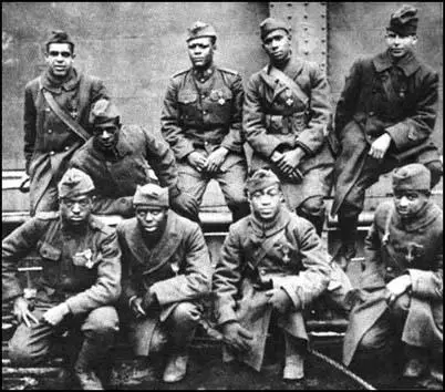 Afro soldiers from the 369th Infantry Regiment proudly wearing their Croix de Guerre medals.