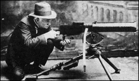 John Moses Browning with his machine-gun
