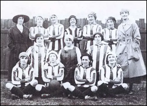 The Dick Kerr team before their first game on 25th December, 1917. Grace Sibbertis second from the left with the ball on her lap.