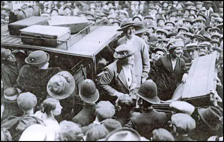 Women councillors leaving for prison. Millie Lansbury (at window),Jeannie MacKay, Susan Lawrence and Nellie Cressall.